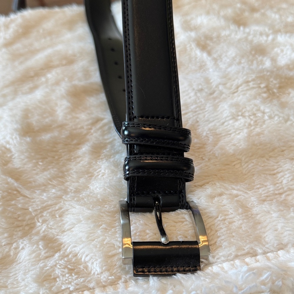 Elegant Black Leather Belt with Silver Buckle